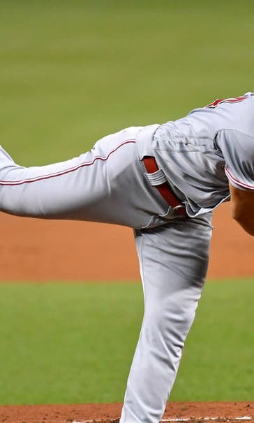 Gray pitches Reds past Marlins 6-3